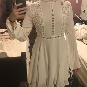 Elegant white dress w floral cutout & bell sleeves